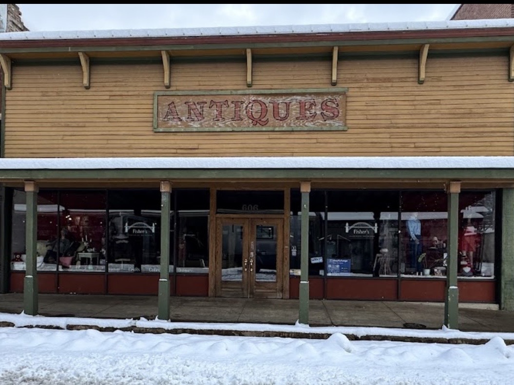 Antiques storefront at 606 Main Street in the snow